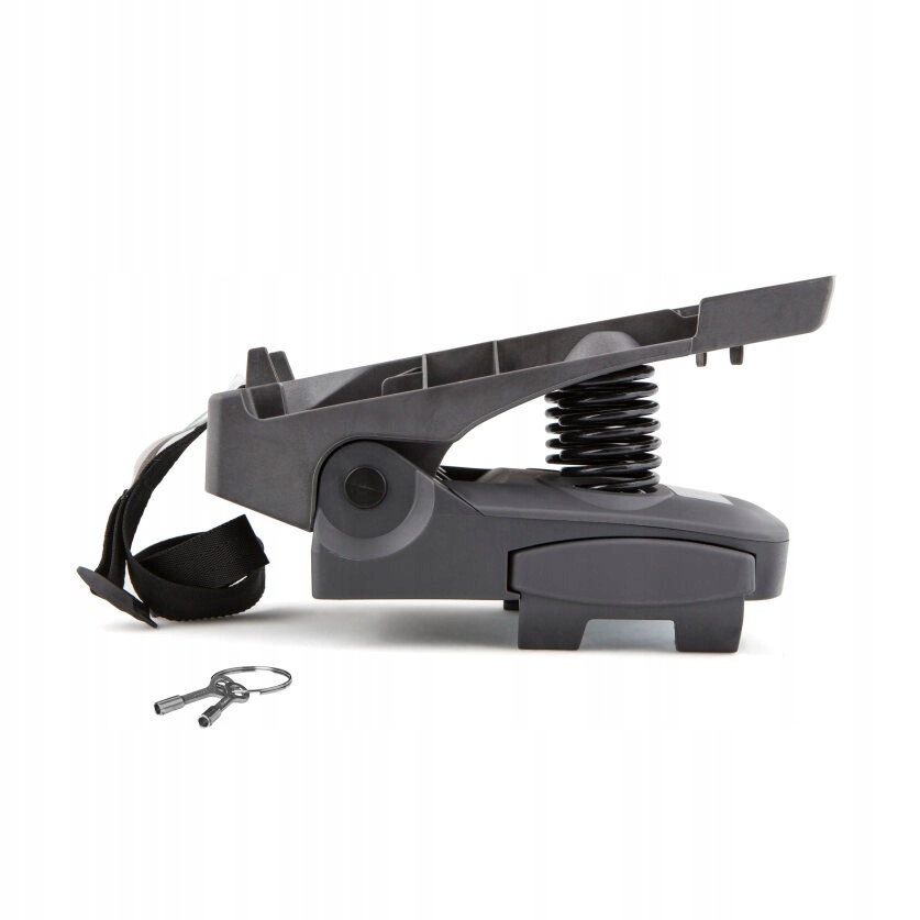 Hamax Universal Sprung Carrier Adapter in dark gray plastic, featuring a spring mechanism, adjustable strap, and key for secure attachment.