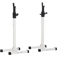 White HOMCOM squat stand pair with adjustable black barbell holders and sturdy base.