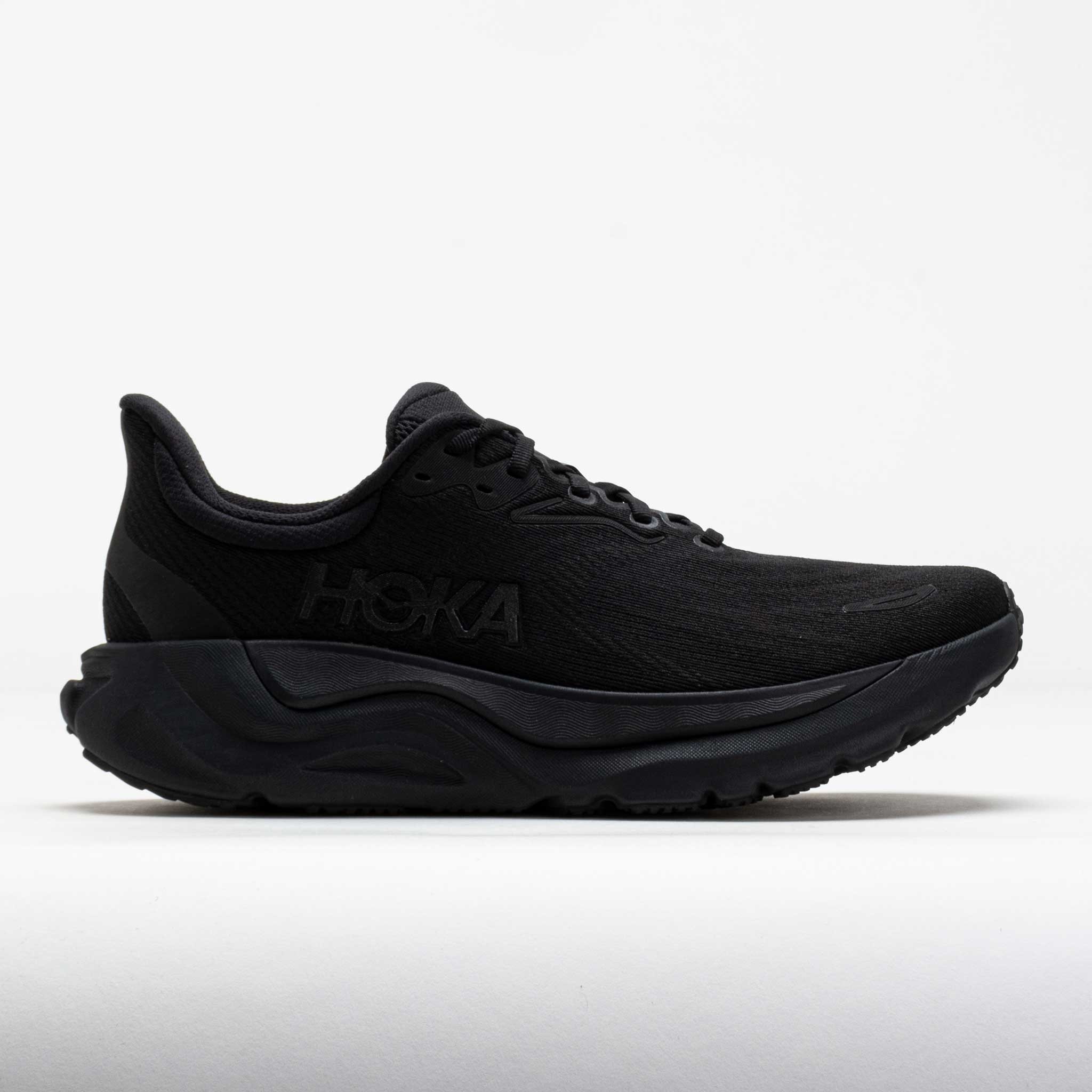 Men's HOKA Arahi 8 running shoes in black, featuring a breathable mesh upper, cushioned midsole, and a sleek design with the HOKA logo prominently displayed on the side.