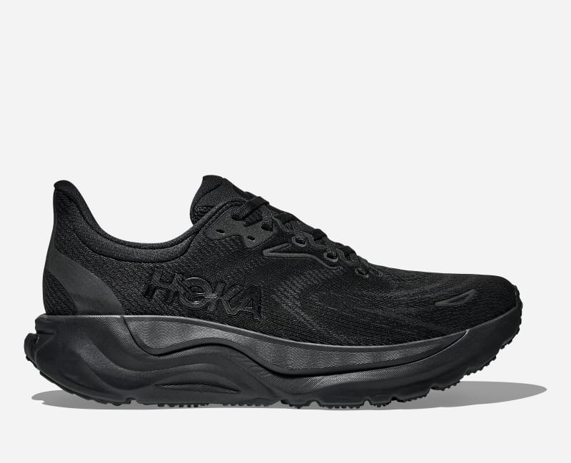 Men's HOKA Arahi 8 running shoes in black, featuring a mesh upper, cushioned midsole, and a sleek design with the HOKA logo prominently displayed on the side.