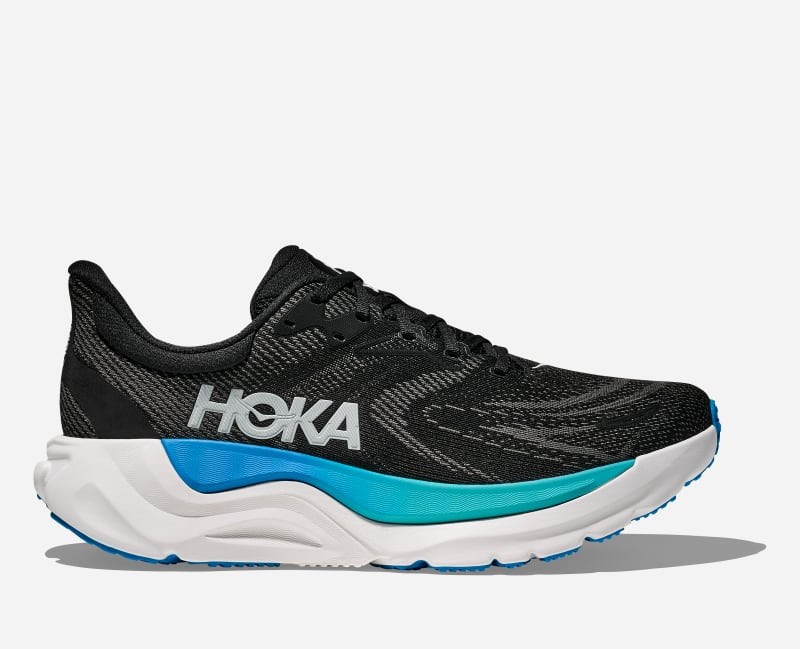 Men's HOKA Arahi 8 shoes in black with skyward blue accents, featuring a breathable mesh upper, cushioned midsole, and a sleek design for stability and support.