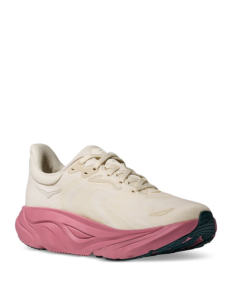 HOKA Women's Arahi 8 road running shoes feature a lightweight alabaster upper with a textured finish, complemented by a vibrant lingonberry midsole and a durable black outsole.