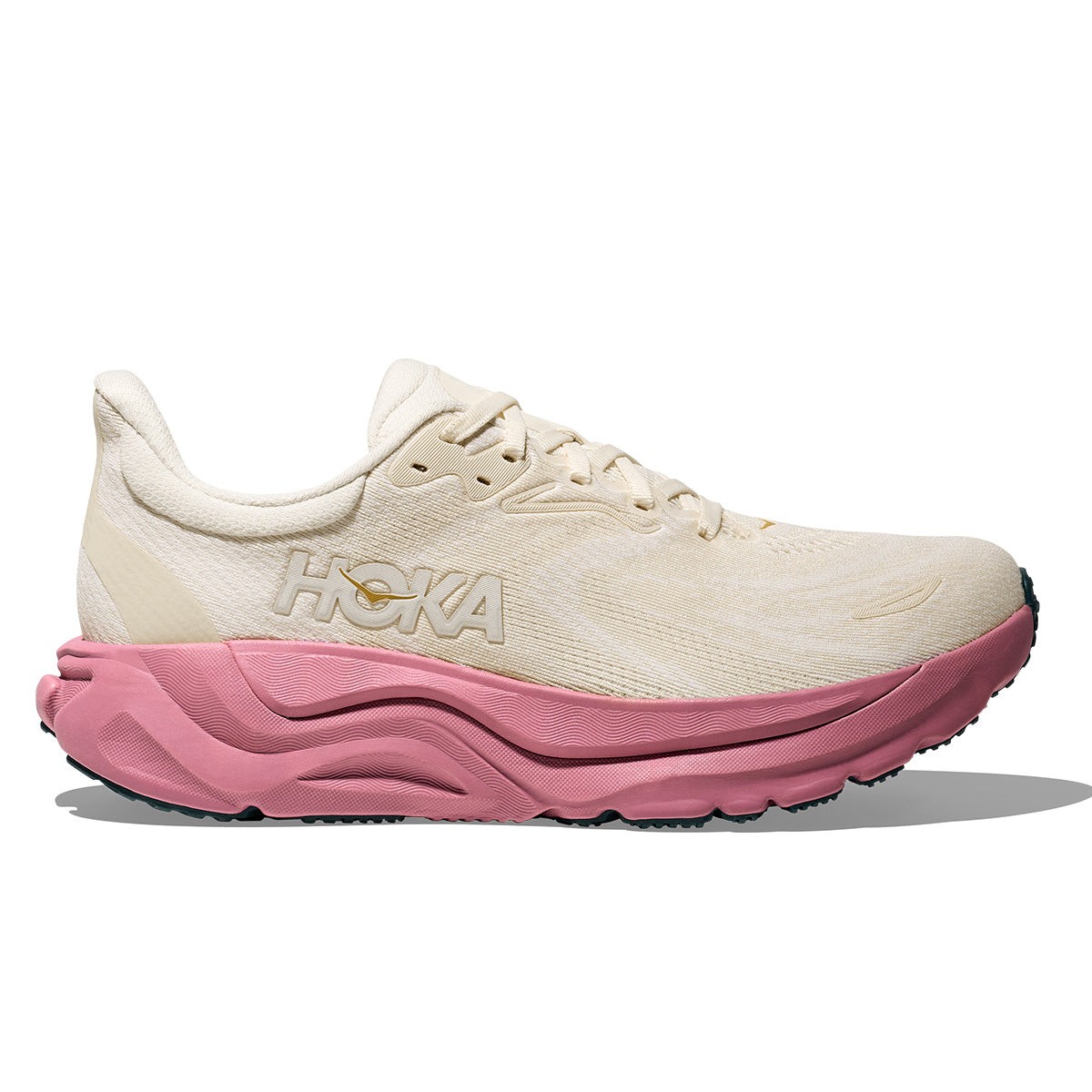 HOKA Women's Arahi 8 Road Running Shoes feature a light alabaster upper with a textured finish, a prominent pink midsole, and a cushioned sole for enhanced comfort, size 8.5 W.