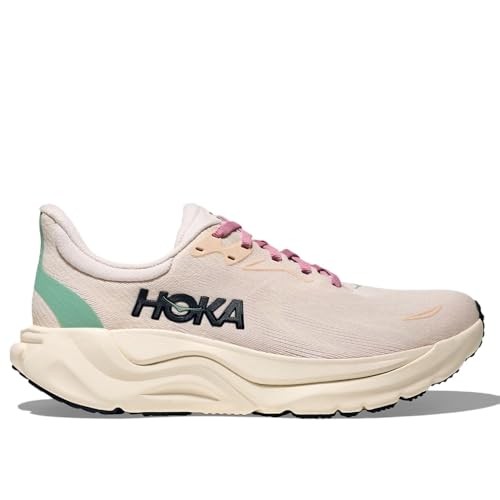 Women's HOKA Arahi 8 running shoes in rose cream and alabaster, featuring a lightweight mesh upper, pink laces, and a cushioned sole with a mint green accent.