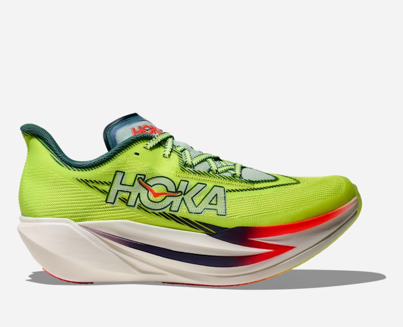 Neon yellow running shoe with a sleek design, featuring a prominent HOKA logo, cushioned sole, and a blend of Thyme green accents, ideal for performance and comfort.