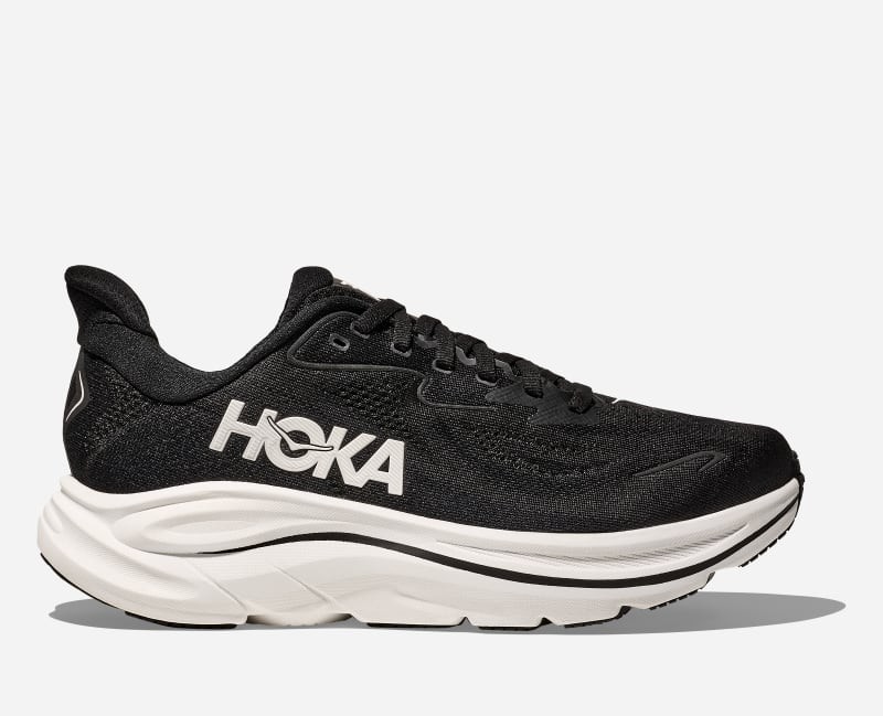 HOKA Women's Clifton 10 road running shoes in black and white, featuring a breathable mesh upper, cushioned midsole, and a lightweight design, size 2.5.