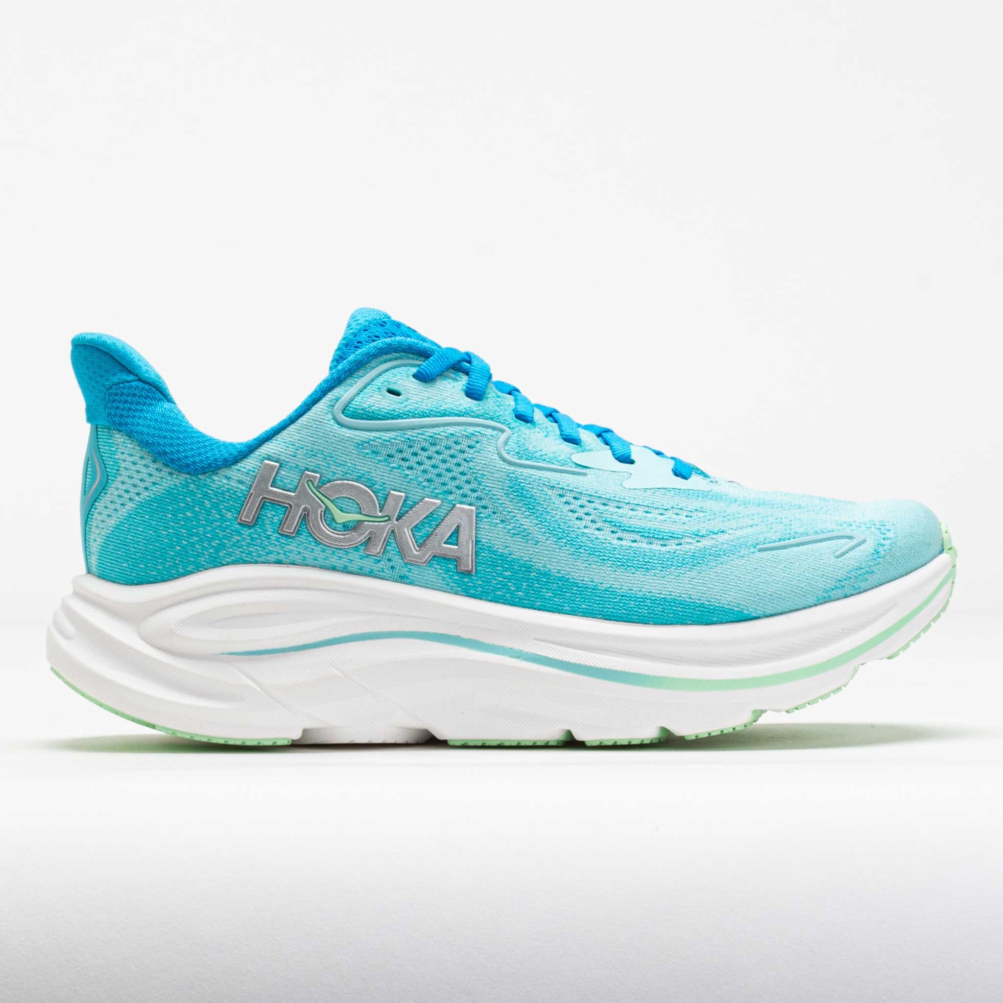 Bright blue HOKA Clifton 10 running shoes for women, featuring a breathable mesh upper, cushioned sole, and silver logo detailing on the side.