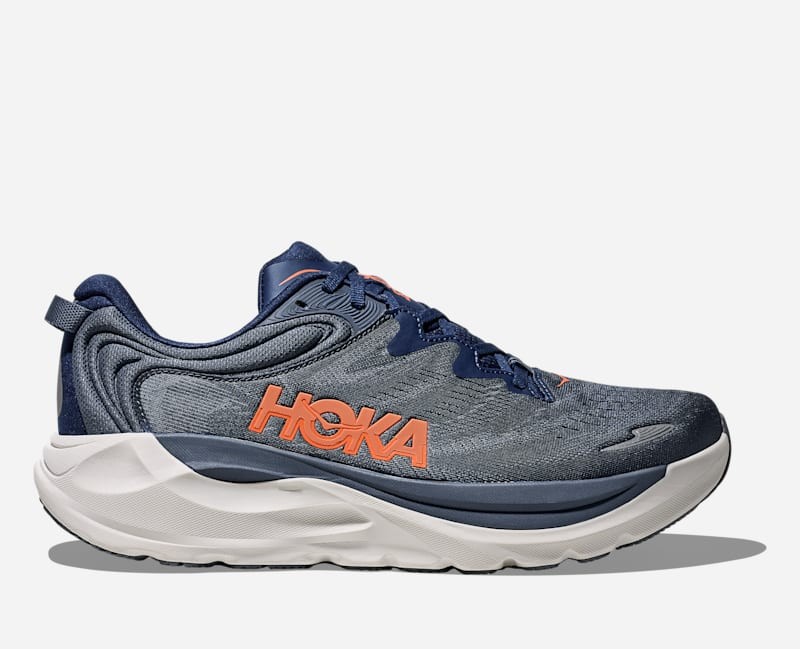 Men's HOKA Gaviota 6 road running shoes in midnight blue and faded navy, featuring a breathable mesh upper, cushioned sole, and bright orange logo, size 10.5.
