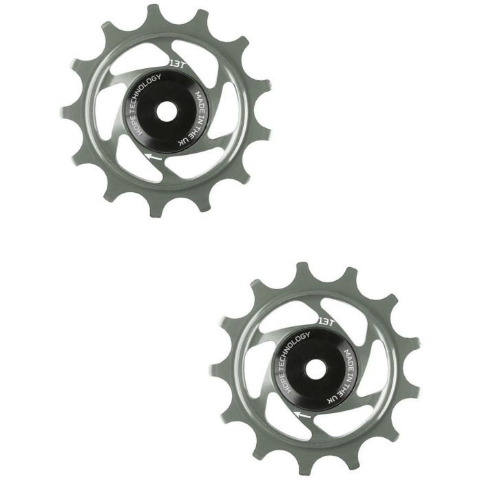 Two smoke-colored 13-tooth jockey wheels with a sleek design, featuring a black center and the "Hope Technology" logo prominently displayed.