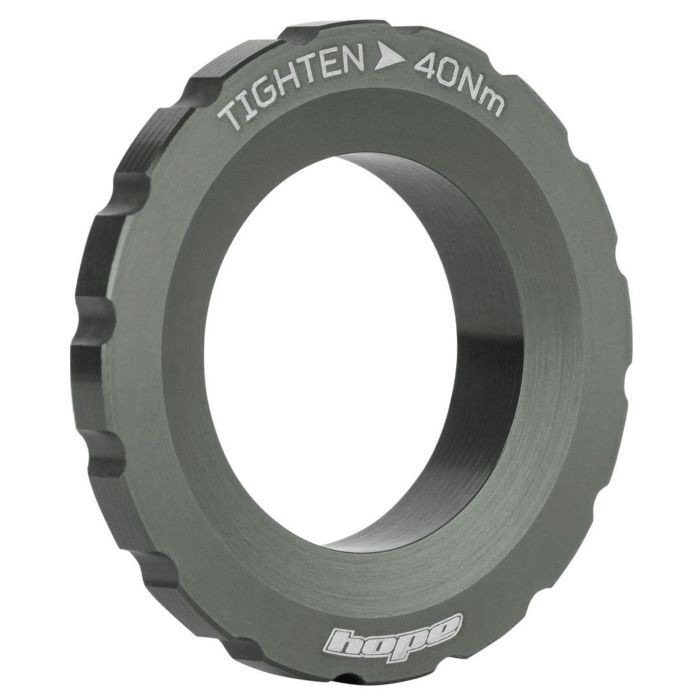Hope Centre Lock Disc Lockring in smoke grey, featuring a textured edge for grip, engraved "TIGHTEN 40N·m" marking, and a durable metal construction for secure disc attachment.