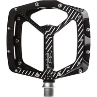 Black Hope F22 flat pedal with silver pins, geometric cutouts, and white striped design.