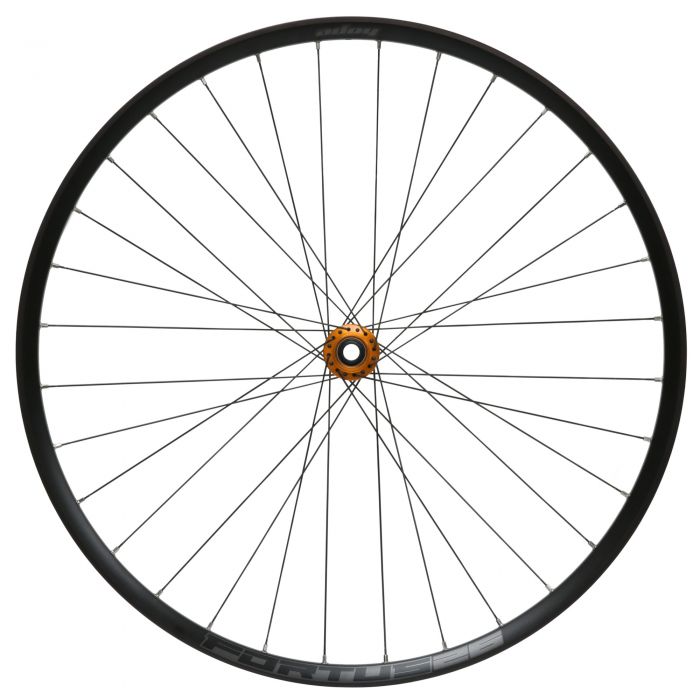 26-inch Hope Fortus 26W Pro5 front wheel in black with orange hub, featuring a 110mm x 15mm Boost spacing and 6 bolt disc mount, designed for durability and performance.