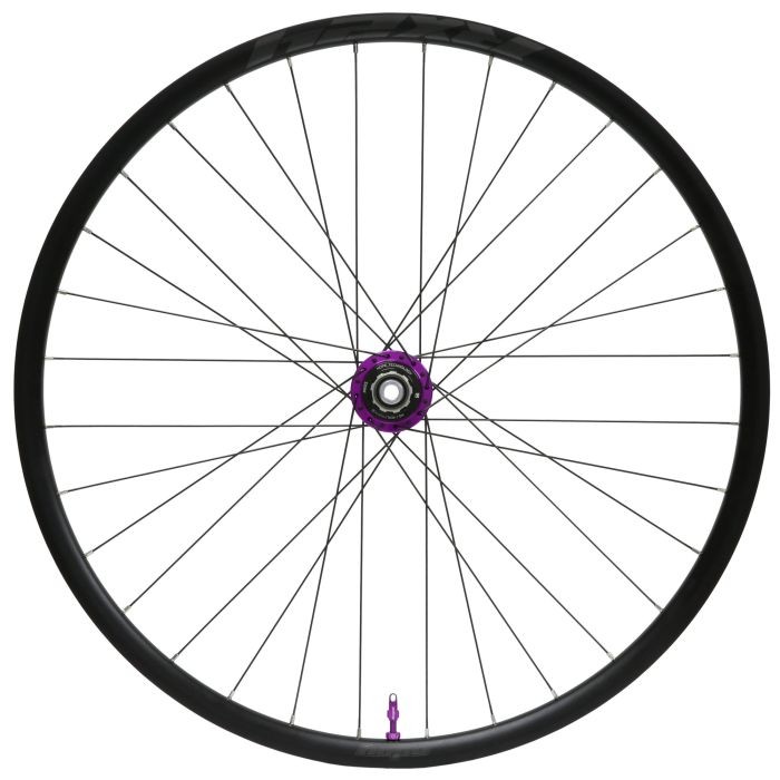 Purple Shimano MicroSpline hub with 32 spokes, black rim, and 700c size, designed for gravel riding, featuring a Centrelock disc brake mount and a 142 x 12mm axle.