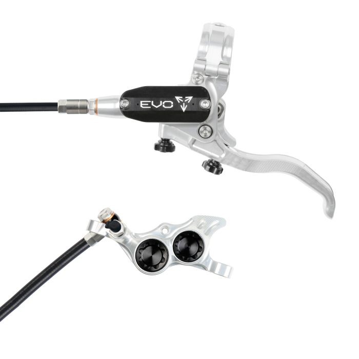 Silver and black Hope Tech 4 EVO TR4 hydraulic disc brake featuring a sleek lever design, adjustable reach, and a compact caliper with dual pistons, suitable for rear left-hand use.
