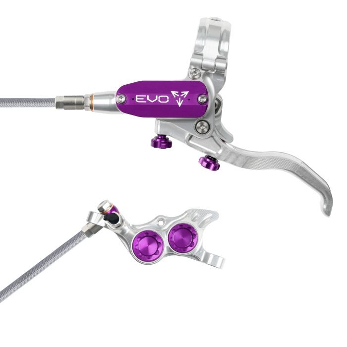Silver and purple Hope Tech 4 EVO TR4 hydraulic disc brake with a braided hose, featuring a sleek lever and adjustable reach, designed for rear left-hand installation.