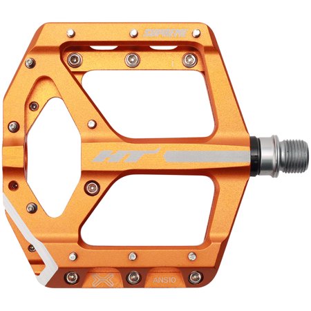 Orange aluminum platform pedal with a hexagonal shape, featuring a silver HT logo, multiple grip pins, and a CrMo spindle for durability.