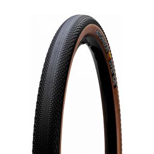 Hutchinson Overide TR gravel tyre in 700 x 40 size features a black tread with a textured surface and tan sidewalls, designed for versatility on various terrains.