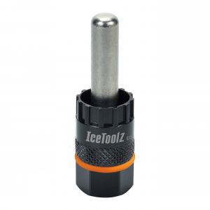 Black and orange Shimano cassette tool featuring a 12mm guide pin, with a textured grip and a shiny metal pin, designed for bike maintenance.