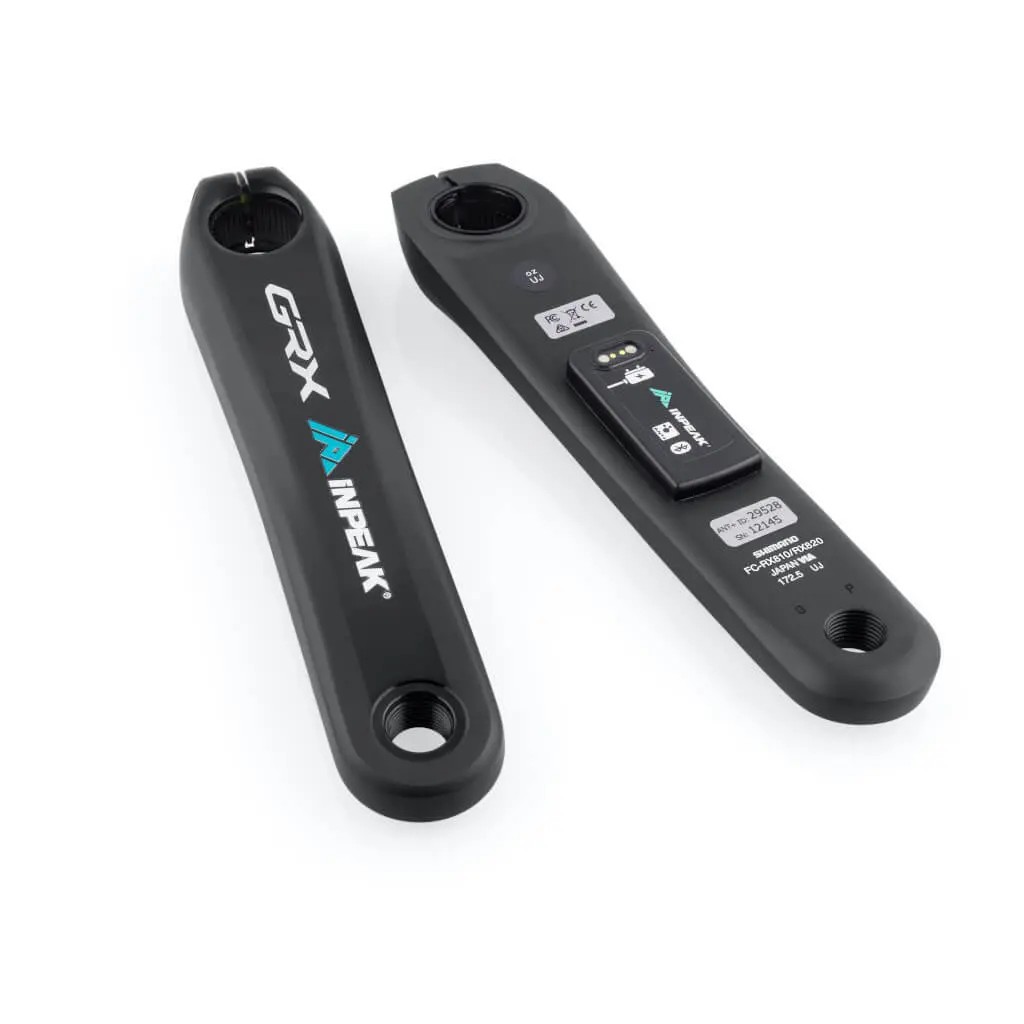 Black power meter crank arms with INPEAK branding and GRX logo, featuring a sleek design and integrated sensors for performance tracking.