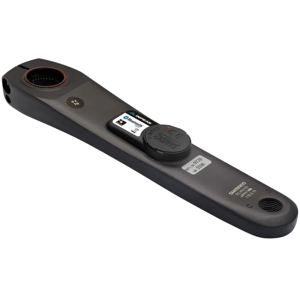 Shimano R8100 Power Meter by INPEAK, featuring a sleek black design, a circular battery compartment, and clear labeling for compatibility and specifications.