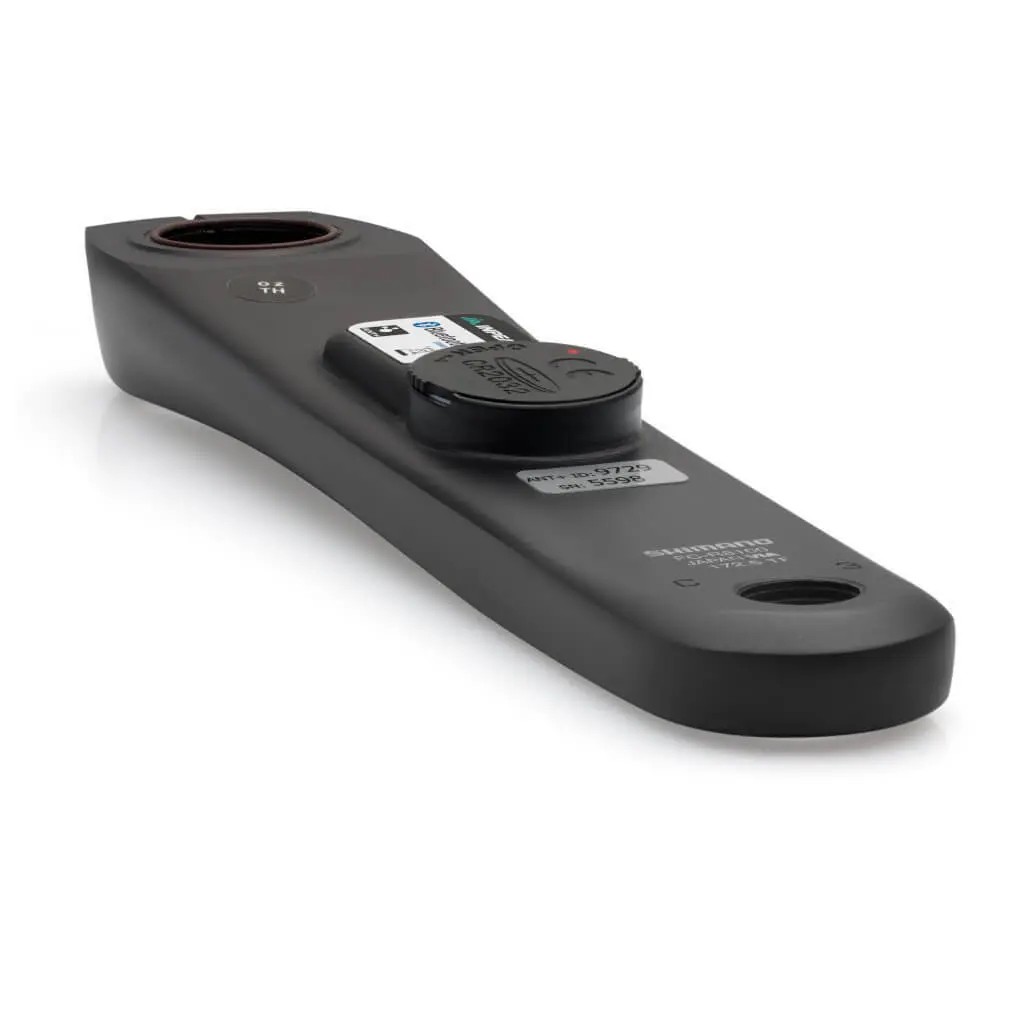 Black power meter crank arm with a sleek design, featuring a round sensor cap, labeled with INPEAK and Ultegra FC-R8100 branding, and a smooth matte finish.