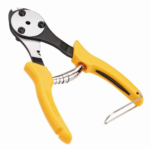 Jagwire Pro Cable Crimper & Cutter features black and yellow rubber grips, a metallic crimping head, and a spring-loaded mechanism for ease of use.