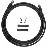 Black Jagwire Pro Hydraulic Hose Kit with connectors and small accessories, coiled and ready for installation.