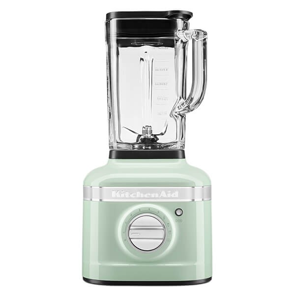 Pistachio green KitchenAid K400 Artisan blender with a glass jar, stainless steel blades, and a control dial on a sturdy base.