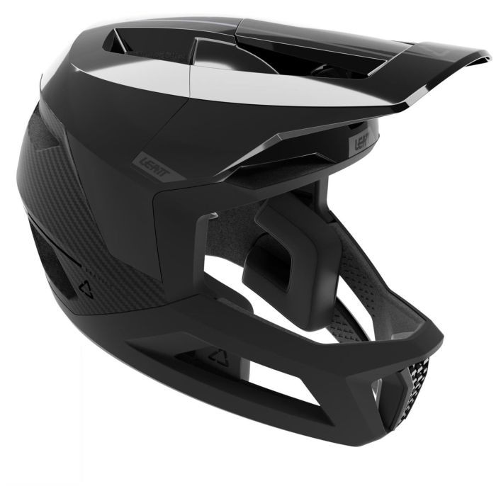 Leatt Gravity 5.0 MTB helmet in black, featuring a sleek design, carbon fiber accents, and ventilation ports, sized L (59-63cm) for optimal fit and safety.