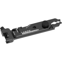 Black Lezyne multi chain pliers with integrated chain breaker and tire lever, compact design with logo on handle.