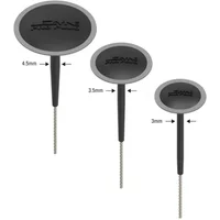 Black Lezyne Tubeless Pro Plugs Tyre Repair Kit with three sizes of round plugs and pointed metal applicators.