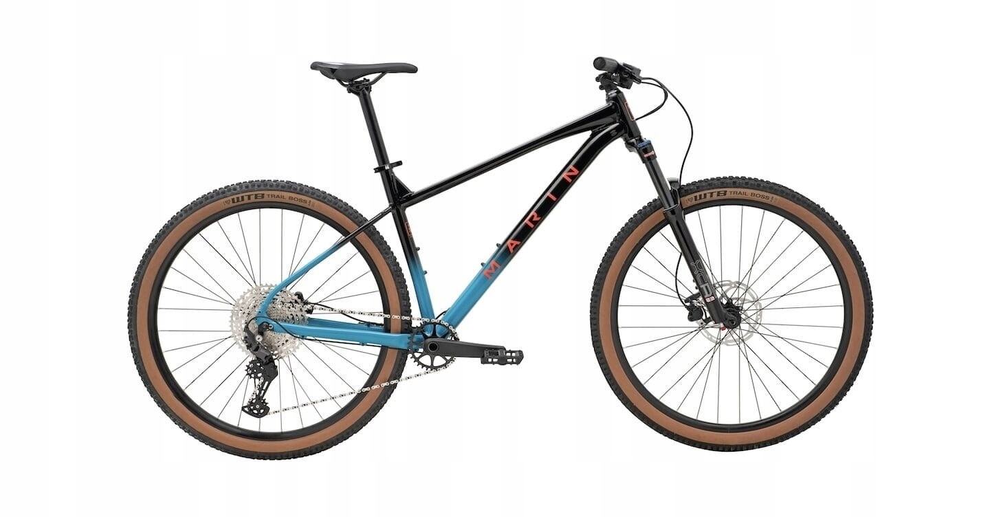 Black and blue Marin Bobcat Trail 5 mountain bike with 29-inch wheels, featuring a lightweight frame, wide tires, and a modern design, suitable for riders 183-191cm tall.