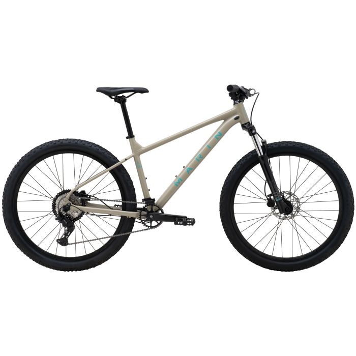 Tan and turquoise Marin Bolinas Ridge 2 hardtail mountain bike with a lightweight frame, 27.5-inch wheels, and disc brakes, designed for rugged terrain.