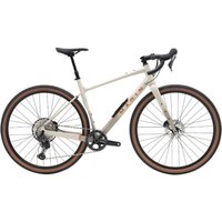 Cream Marin Headlands 2 gravel bike with drop handlebars, disc brakes, and brown-treaded tires.