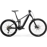 Black Merida eOne-Forty 400 electric mountain bike with thick tires, front suspension, and disc brakes.