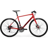 Red Merida Speeder 200 bicycle with flat handlebars, black tires, disc brakes, and sleek frame design.
