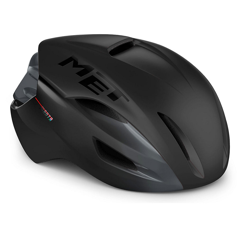 Large matte glossy black MET Manta MIPS helmet featuring aerodynamic design, ventilation slots, and a prominent MET logo on the side.