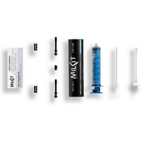 milKit Compact Kit with black valve stems, syringe, sealant bottle, and white applicator tubes arranged neatly.