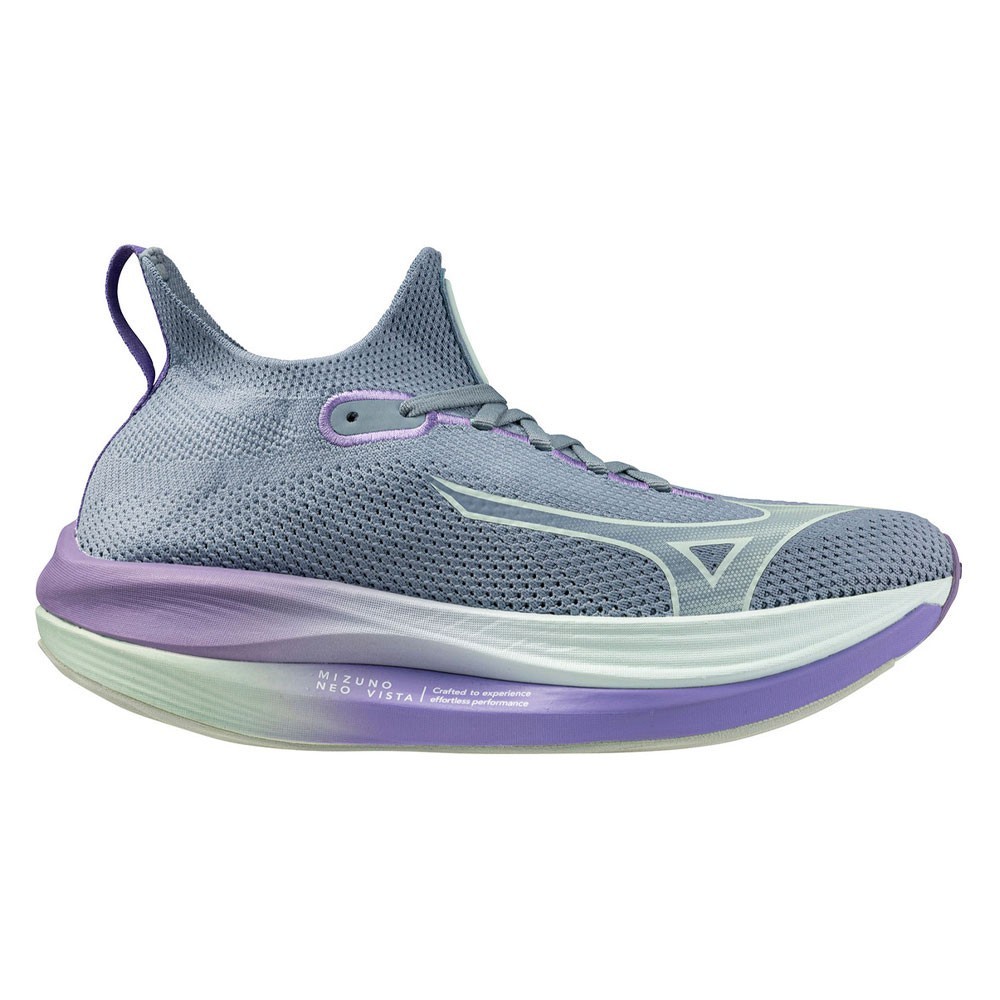Light purple and blue Mizuno Neo Vista women's running shoes feature a breathable mesh upper, a cushioned sole, and a sleek design, size 6.5.