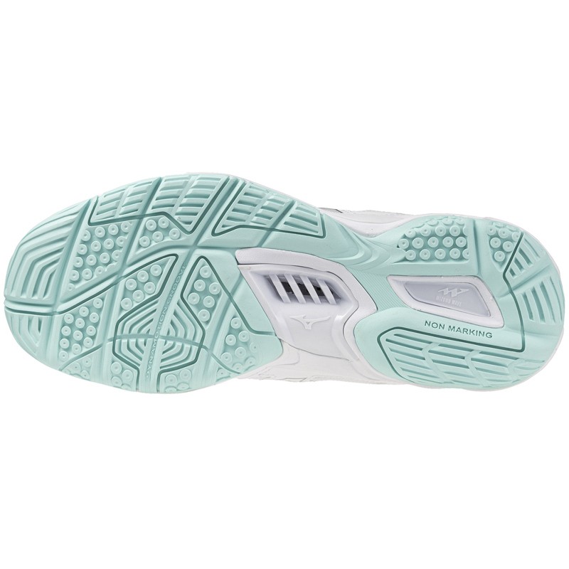 Women's Mizuno Wave Phantom 3 training shoes feature a white upper with mint green accents, a cushioned sole, and a non-marking rubber outsole designed for traction.