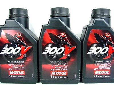 Black plastic bottle of Motul 4T FL ROAD RACING engine oil, featuring a red and black label, with the product name, viscosity 15W-50, and 1L capacity prominently displayed.