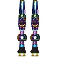 Muc-Off Big Bore Lite Tubeless Valves, iridescent finish, cylindrical shape, with rubber seals and lock rings.