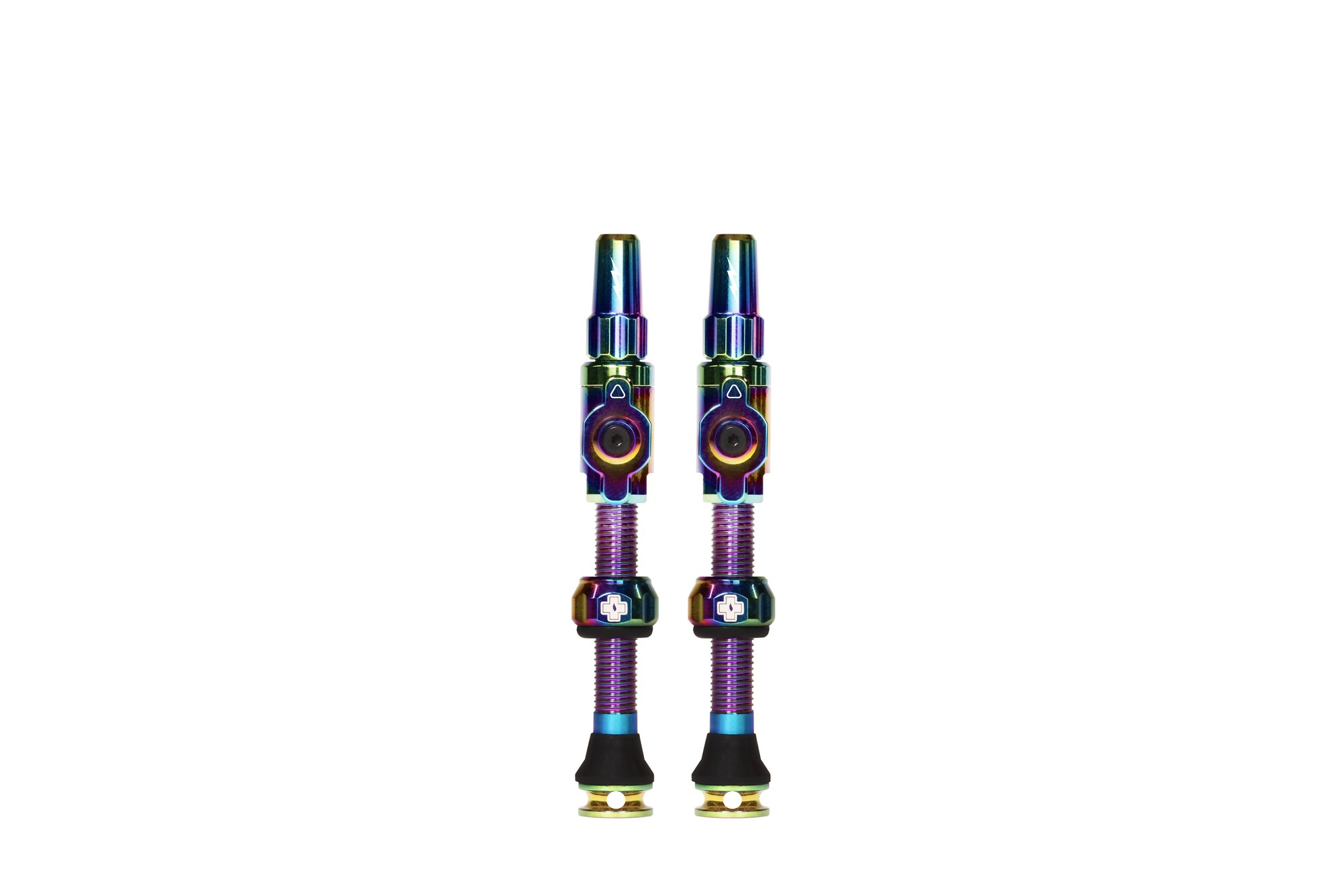 Two iridescent Muc-Off Big Bore Tubeless Valves in a lightweight design, featuring a shiny metallic finish, rubber seals, and adjustable nuts for easy installation.