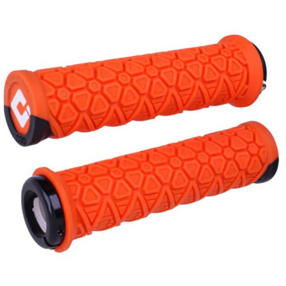 Bright orange ODI Vanquish MTB lock-on grips featuring a textured honeycomb pattern for improved grip and control, with black end caps for durability.