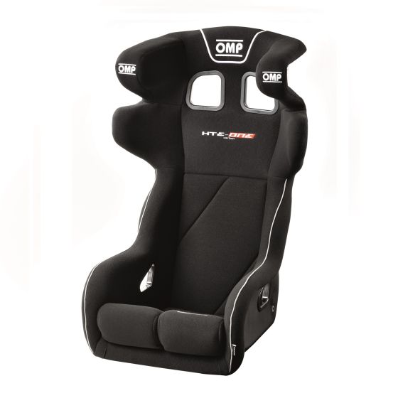 Black carbon racing seat with high side bolsters, shoulder support, and cutouts for harnesses, featuring OMP branding and white stitching details.
