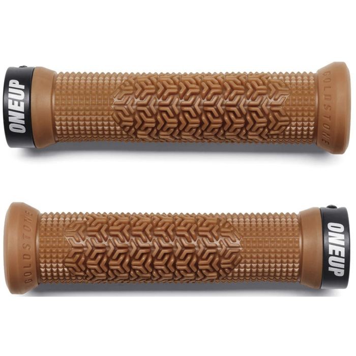 Tan rubber grips with a textured pattern and black end caps, featuring the "ONEUP" logo, designed for enhanced grip and comfort in cycling.
