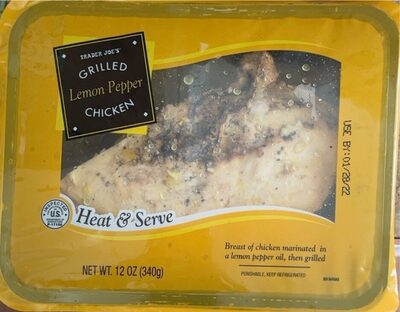 Grilled Lemon Pepper Chicken in a yellow plastic tray, featuring marinated chicken breast with visible lemon pepper seasoning and a "Heat & Serve" label.