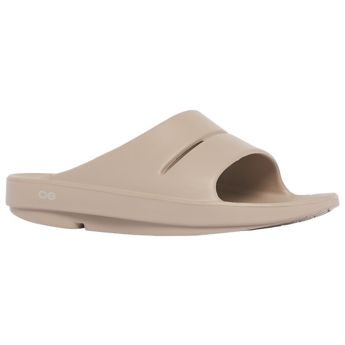 Beige OOFOS Ooahh Slide Sandals with an open toe design, made from soft, durable foam material, featuring a contoured footbed for comfort and support.