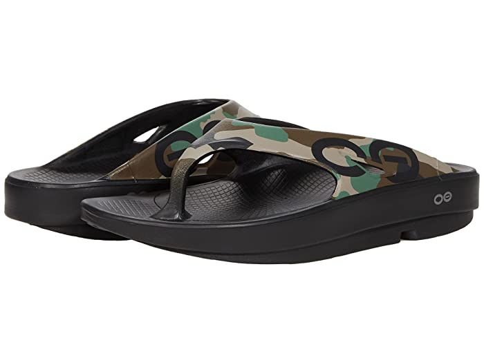 Woodland camo flip-flops with a black rubber sole, featuring a textured footbed and a sleek design, ideal for comfort and support, size 9.