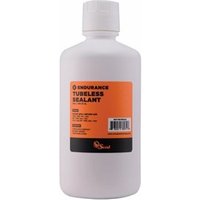 White bottle of Orange Seal Endurance Tubeless Sealant with orange label, black text, and white cap, 946ml capacity.